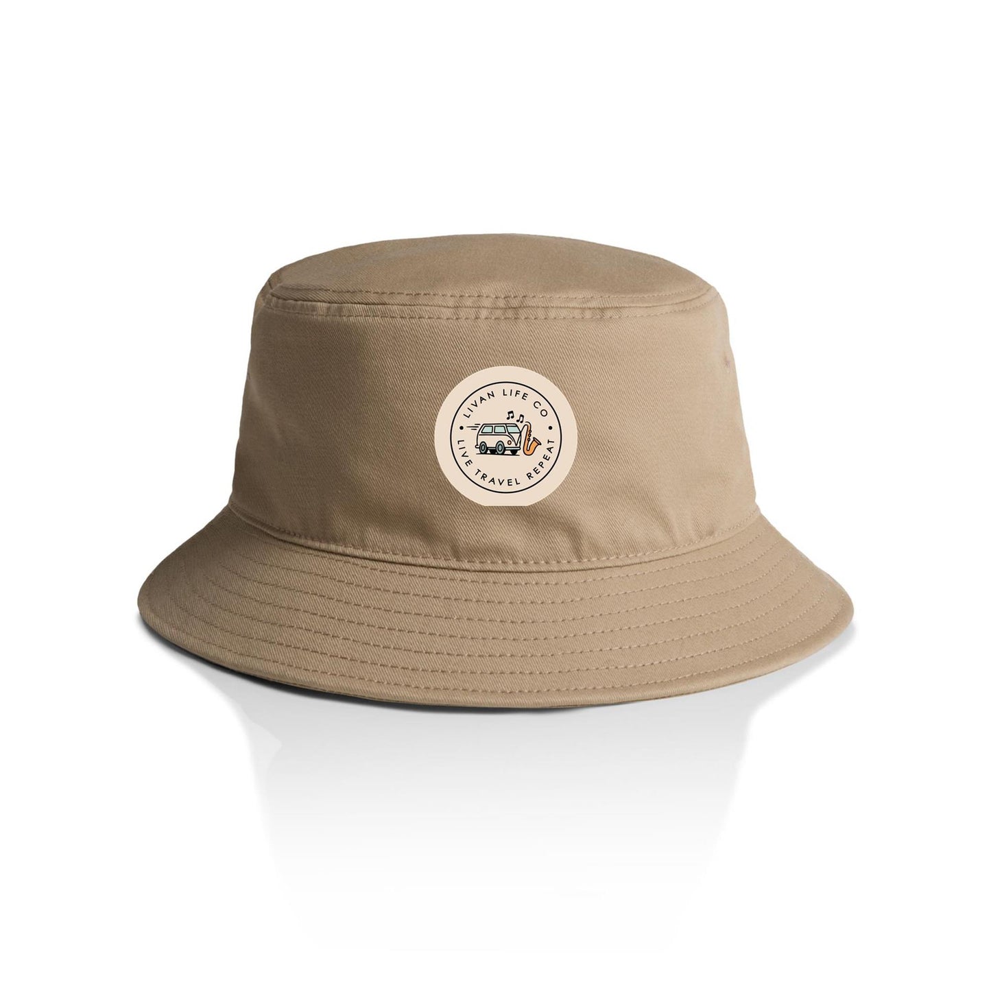 Beige bucket hat with a logo on a light green background