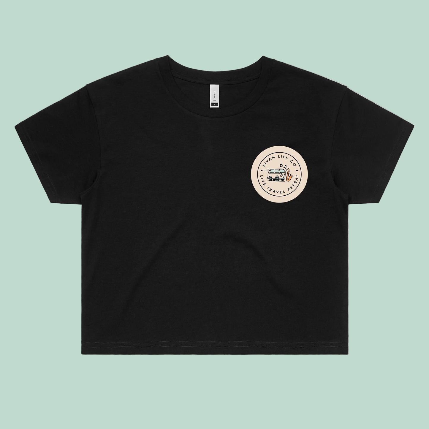 Black t-shirt with a circular logo on a light blue background