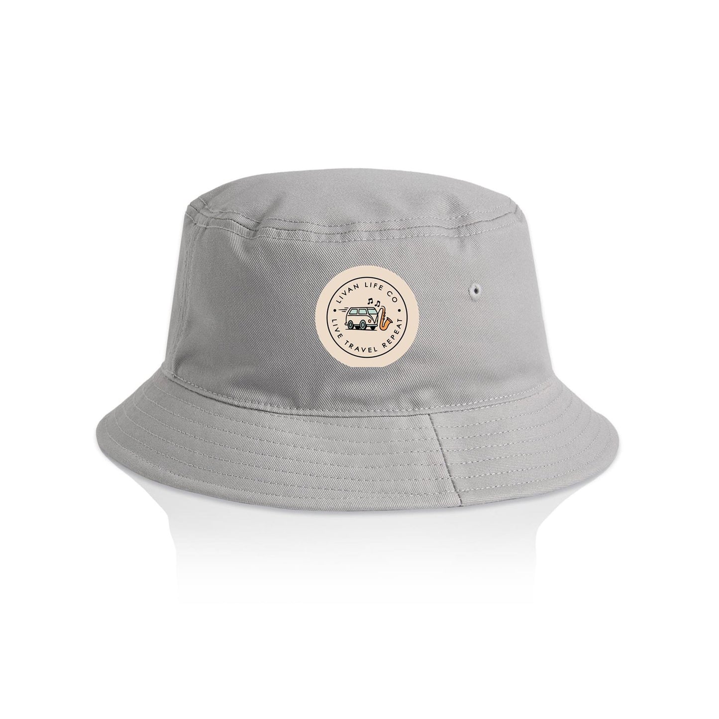Gray bucket hat with a circular logo on a light grey background