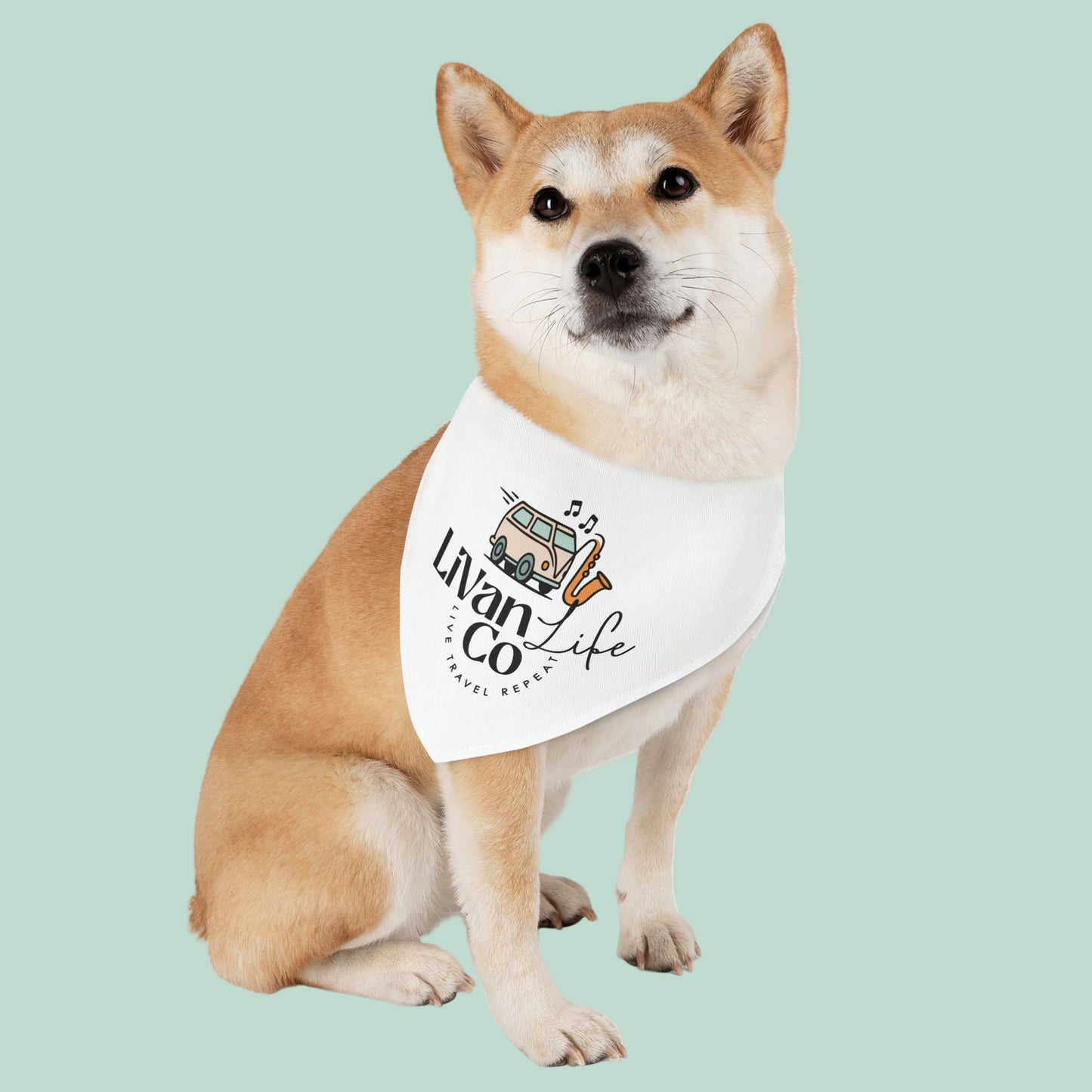 Dog wearing a bandana with 'Livan Co Life' text and graphic on a white background